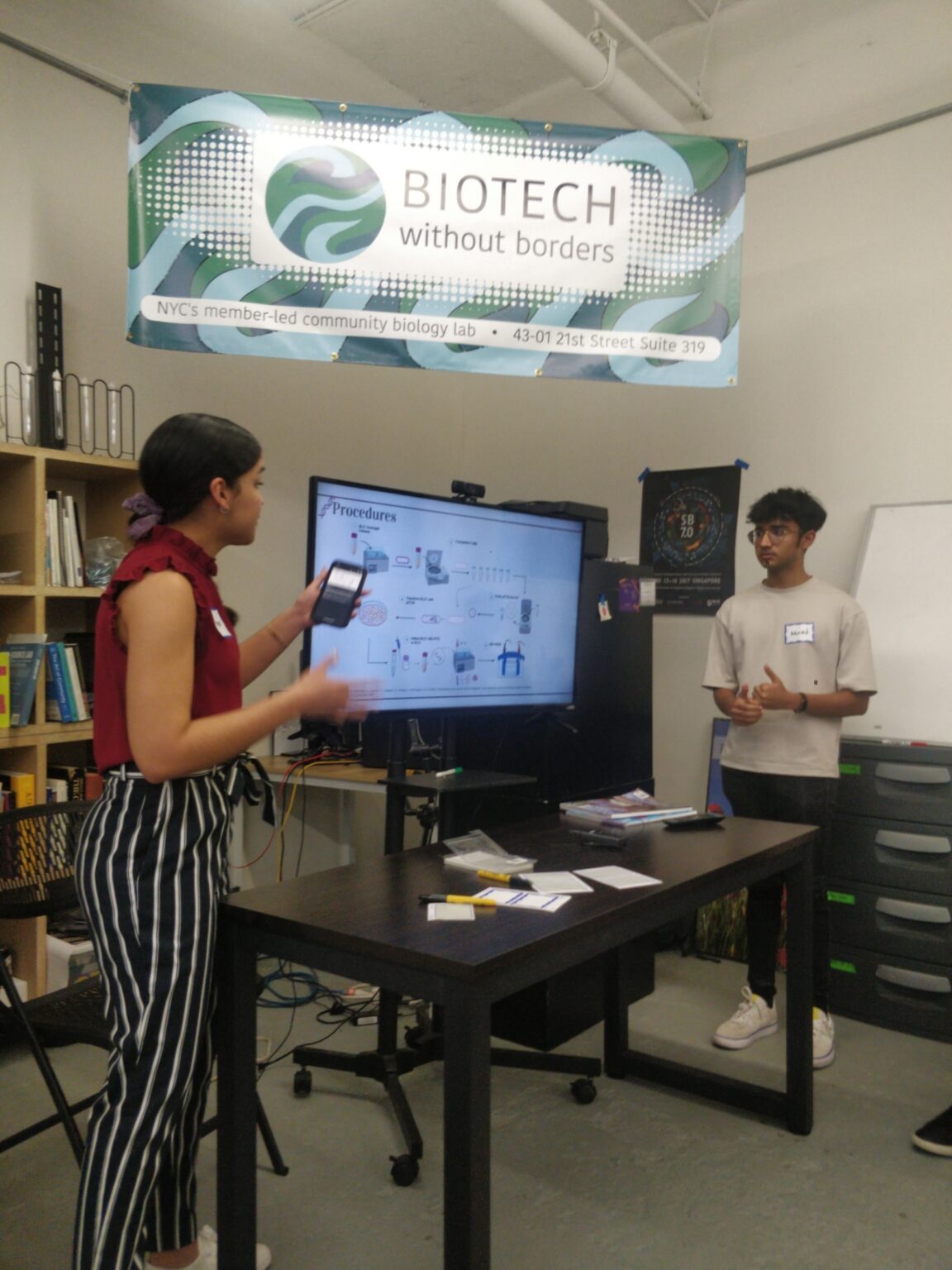 Photo of Raysa and Ahmed presenting their final project results
